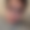 K.