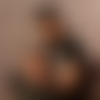 J.