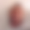 T.