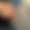 J.